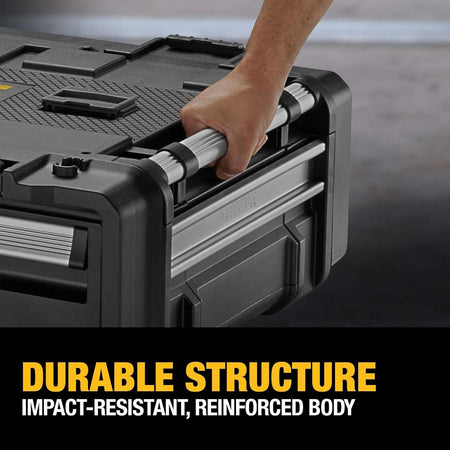 Close-up detail of a hand gripping the durable aluminum carry handle on the side of the unit, captioned Durable Structure Impact-Resistant, Reinforced Body.