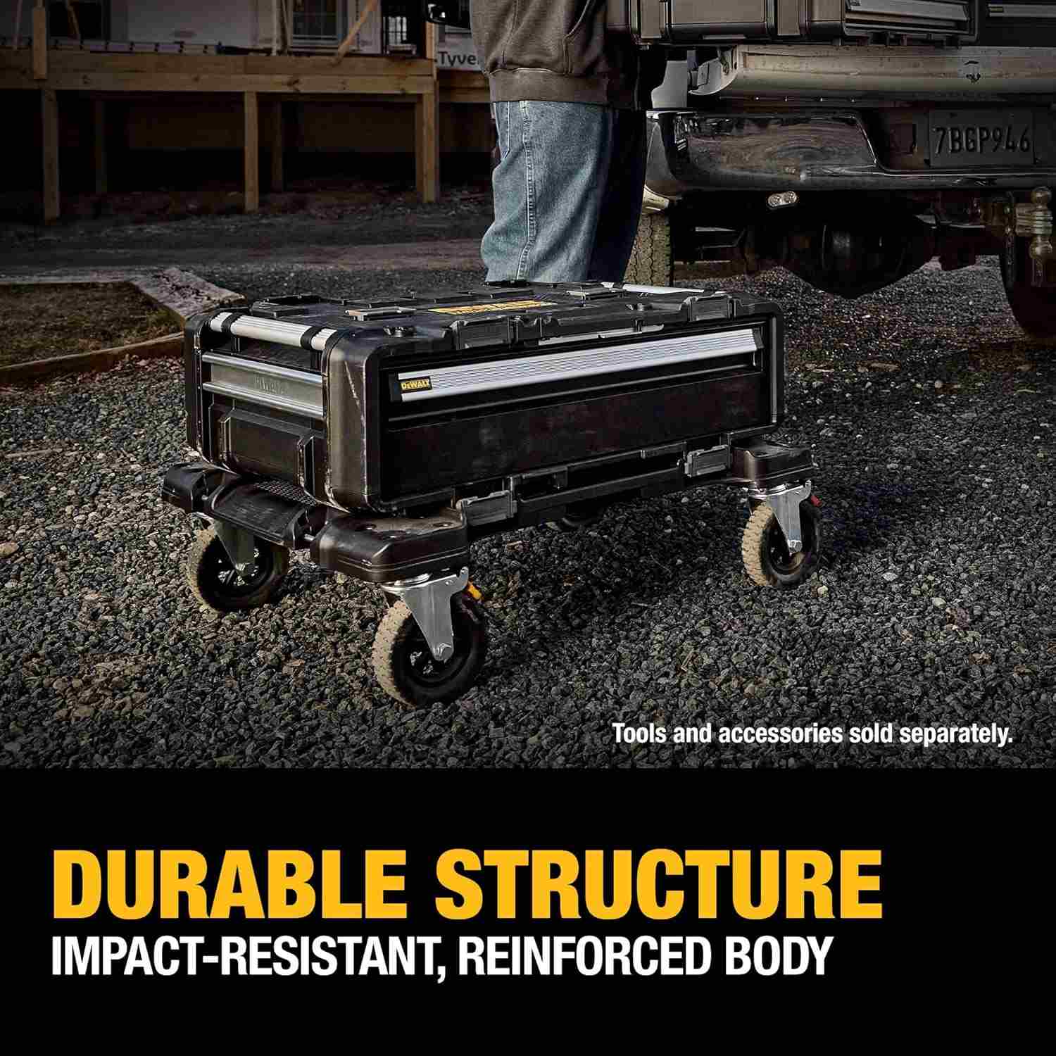 Outdoor shot of the dolly supporting a single drawer unit on a gravel surface near a work truck, captioned Durable Structure Impact-Resistant, Reinforced Body.
