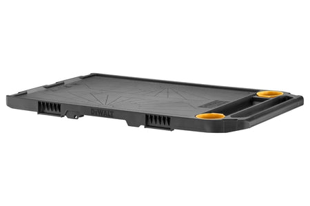 Studio view of the DeWalt ToughSystem 2.0 DXL worktop featuring a black surface with integrated measurement markings, two yellow cup holders, and a large handle.