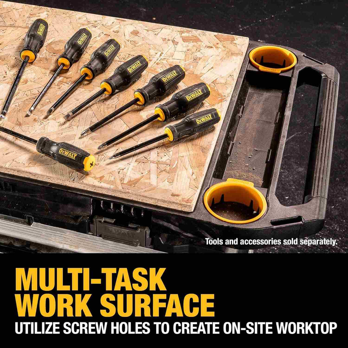 Close-up view of plywood mounted to the worktop surface with screwdrivers resting on top, captioned Multi-Task Work Surface Utilize screw holes to create on-site worktop.