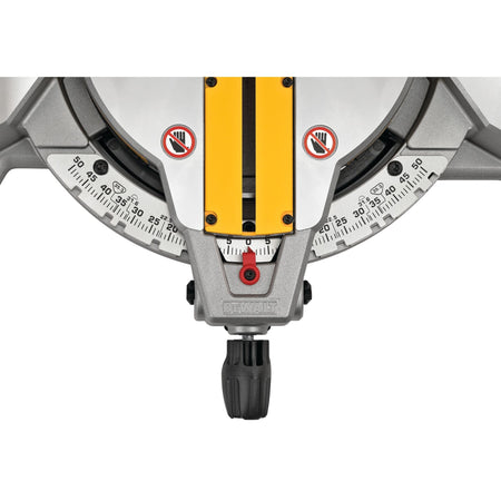 Close-up of the DeWalt DWS713 miter scale pointer and stainless steel detent plate showing precise degree increments for miter cuts.