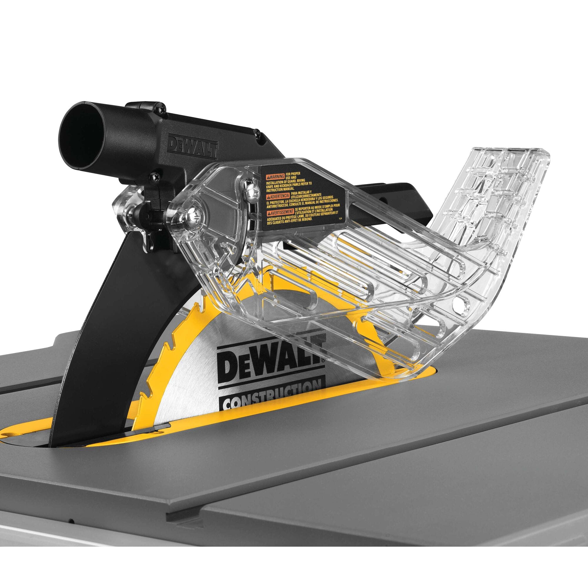 Clear blade guard and riving knife assembly installed over the 10-inch carbide blade on the DeWalt DWE7491RS table saw.