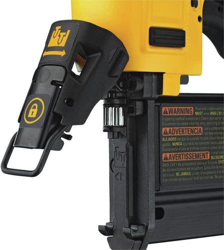 A close-up studio shot of the tool-free jam release mechanism on the nose of the DeWalt DWFP2350K pin nailer.