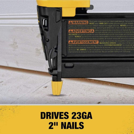 A close-up marketing graphic of the nose of the DeWalt pin nailer, with text that reads "DRIVES 23GA 2" NAILS".