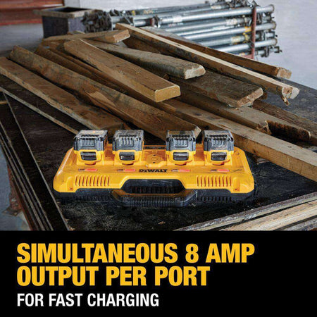 A studio shot of the Dewalt DCB104 charger on a workbench with four batteries docked; text overlay emphasizes the Simultaneous 8 Amp Output Per Port for Fast Charging.