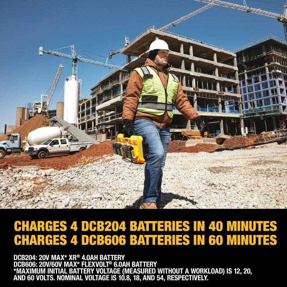A construction worker carrying the Dewalt DCB104 charger at a job site; text overlay indicates it charges four DCB204 4.0Ah batteries in 40 minutes and four DCB606 6.0Ah FlexVolt batteries in 60 minutes.