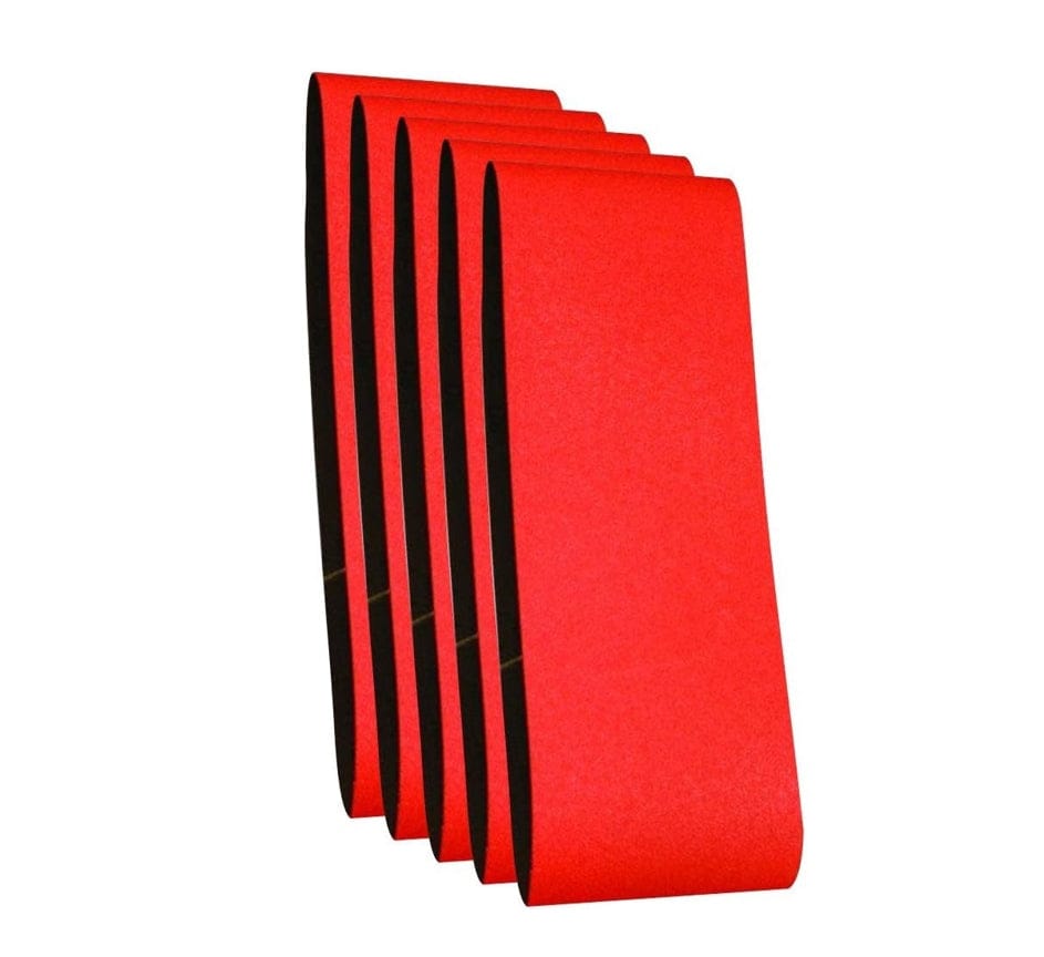 This is an eye-level, slightly angled shot showing a stack of five bright red Diablo 3x18-inch ultra coarse sanding belts, fanned out and angled from the lower left to the upper right. The top surfaces of the belts are a vibrant red, while their darker undersides are visible where they overlap, all set against a neutral background.