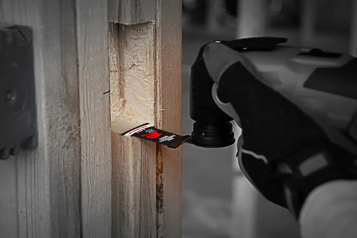 The Diablo Demo Demon oscillating blade performing a precise plunge cut into a wooden structural beam in a professional residential construction setting.