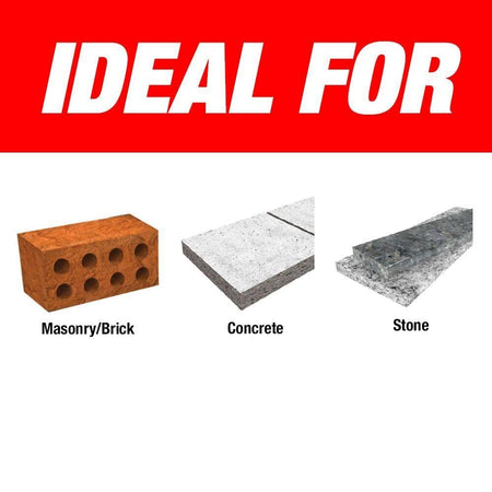 Action shot of the Diablo Red Granite carbide-tipped hammer drill bit being used with a cordless drill to bore an accurate hole into a white brick masonry wall.