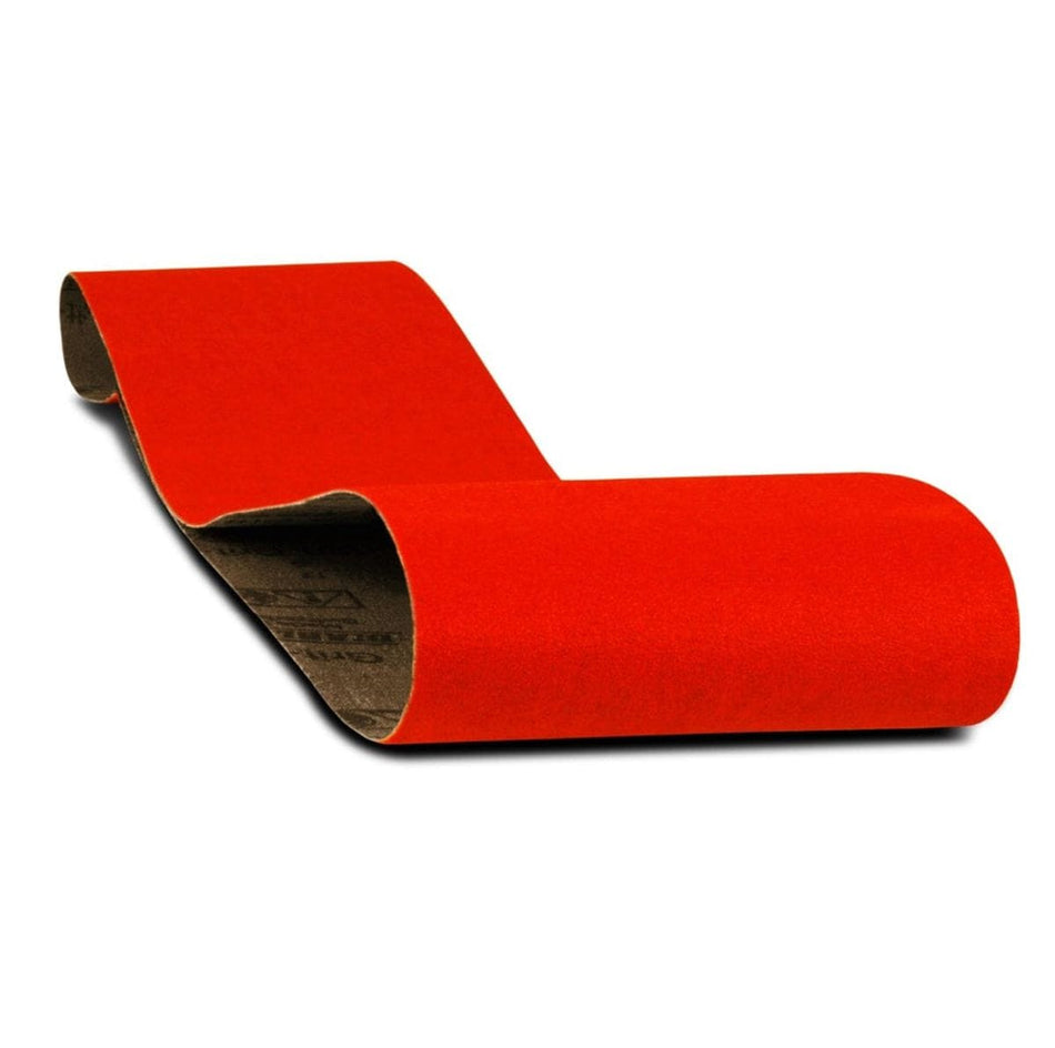 A studio photograph of a red Diablo zirconium sanding belt showing the continuous loop design and the heavy-duty cloth backing.