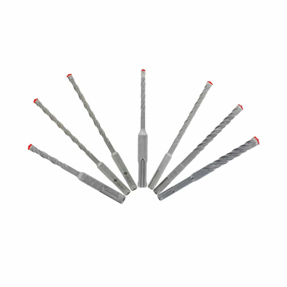 The seven Diablo Rebar Demon SDS-Plus hammer drill bits fanned out, clearly showing the red full carbide heads, twisted flutes, and SDS-Plus shanks.
