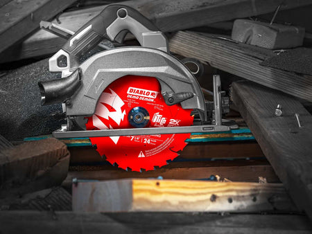 A Diablo Demo Demon 7-1/4 inch framing saw blade installed on a circular saw, placed on a jobsite amongst lumber to demonstrate professional framing and demolition applications.