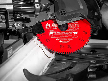 Action shot of a Diablo D1090X Ultimate Polished Finish blade installed in a professional miter saw, demonstrating its precision capability for high-end trim and molding projects.