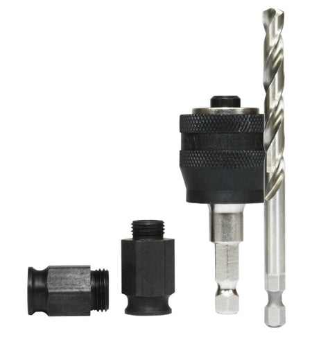 Studio shot of the kit contents showing the black Snap-Lock Plus mandrel, a long silver pilot bit, and two black threaded adapter nuts.