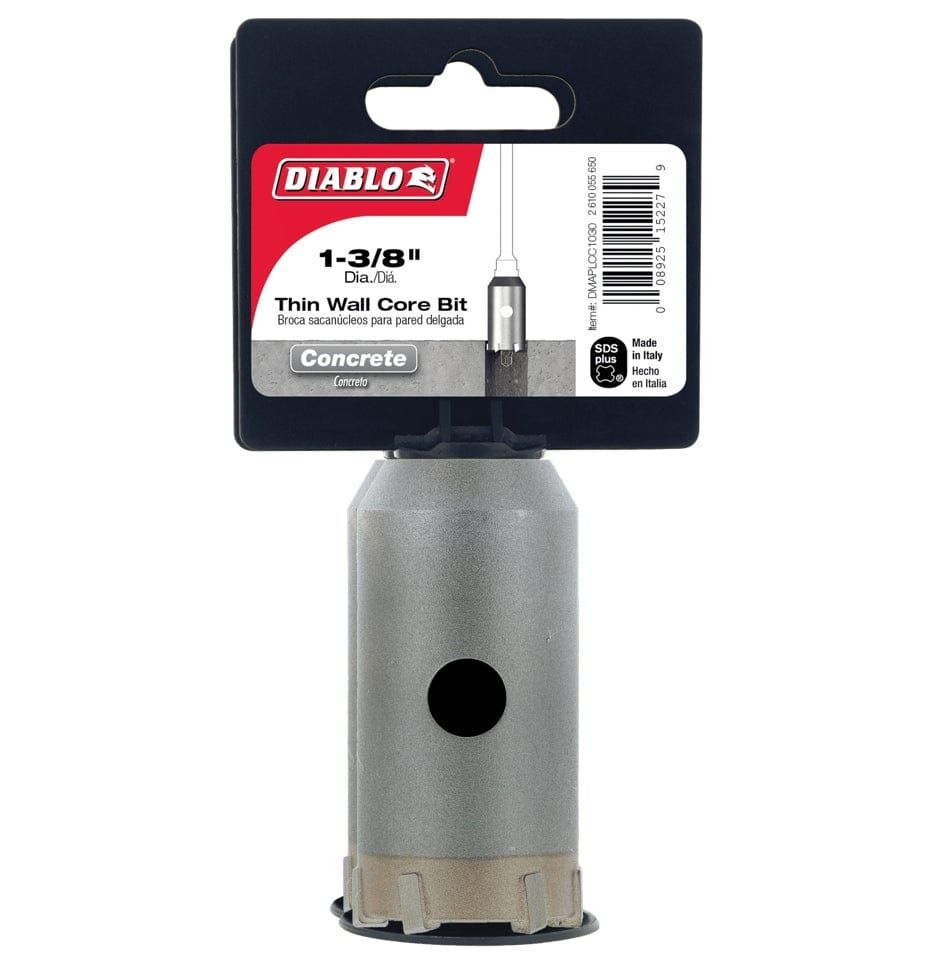 A close-up of the Diablo core bit highlighting the two ejector holes on the side of the steel body, designed to allow for easy removal of material cores after drilling.