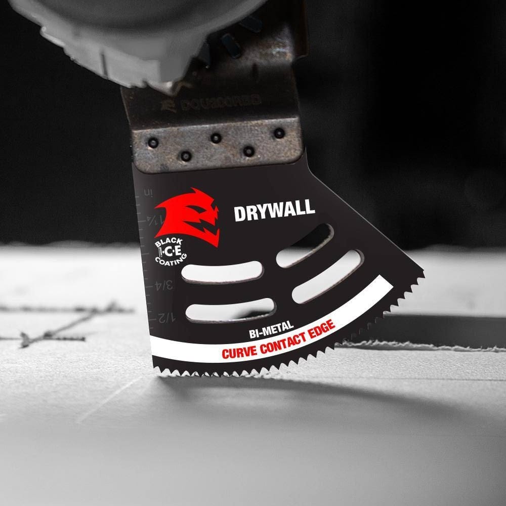 Close-up action shot of the Diablo bi-metal curve contact edge drywall blade performing a precise plunge cut through a drywall surface, demonstrating a clean and controlled finishing cut.