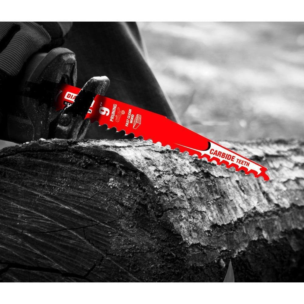Action shot of a Diablo Demo Demon 9 inch carbide tipped reciprocating saw blade aggressively cutting through a large wood log for pruning and demolition.