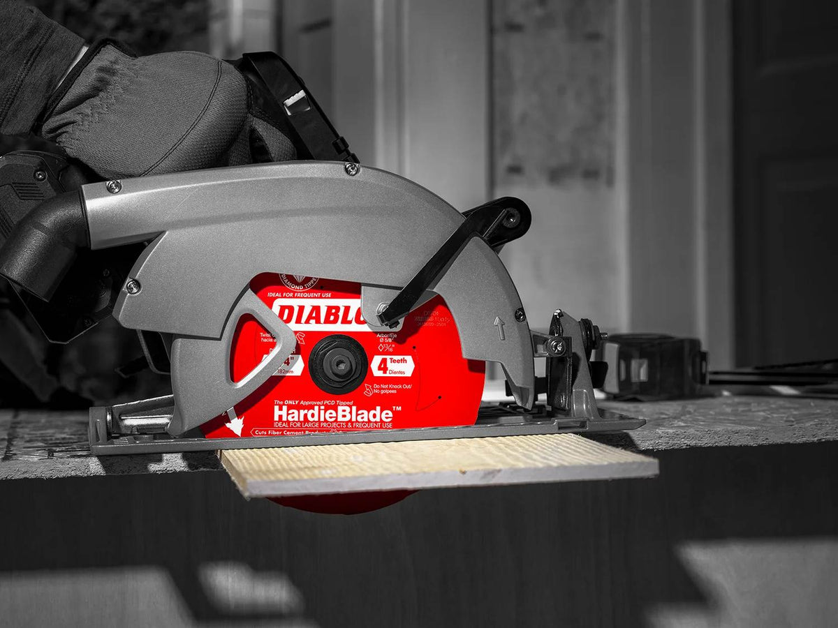 Angled close-up view of the Diablo D0704DHA saw blade showing the detailed alignment of the anti-vibration laser-cut stabilizers, stabilizing vents, and a Polycrystalline Diamond (PCD) tipped tooth for extreme cutting life.