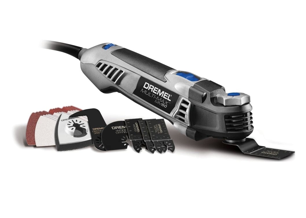 A studio shot of the Dremel Multi-Max MM50 oscillating tool, shown with its 30-piece accessory set of cutting blades and sanding pads.