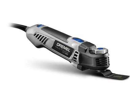 A studio shot of the Dremel Multi-Max MM50 5.0 amp oscillating tool with a wood flush cut blade attached, highlighting its angled body.