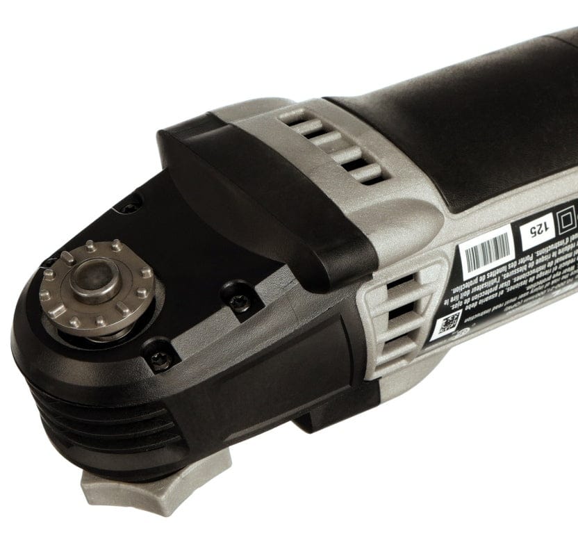 A close-up of the accessory interface on the Dremel Multi-Max MM50, showing the tool-less mechanism without a blade attached.