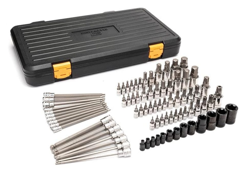 The complete contents of the 80-piece GEARWRENCH bit socket set laid out in front of the closed black and orange blow mold storage case.