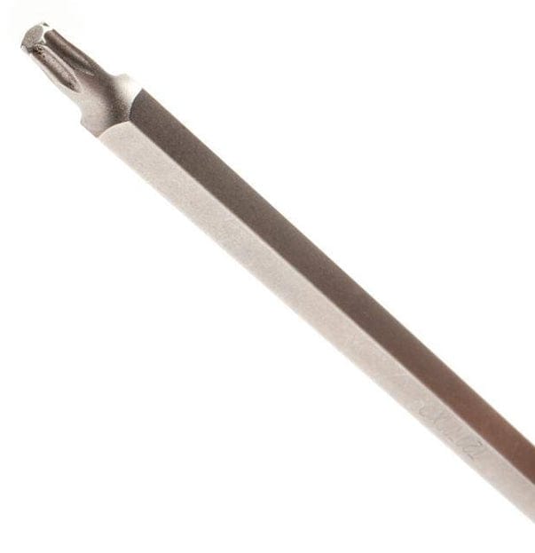 A close-up studio shot of a long, silver S2 steel Torx bit, showing the six-point star design used for recessed Torx fasteners.