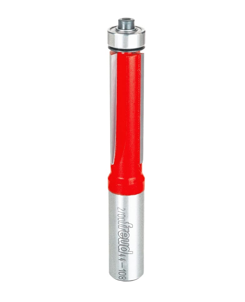 Freud 44-108 1/2 inch diameter three-flute flush trim router bit shown with a red body, silver shank, and top-mounted bearing.