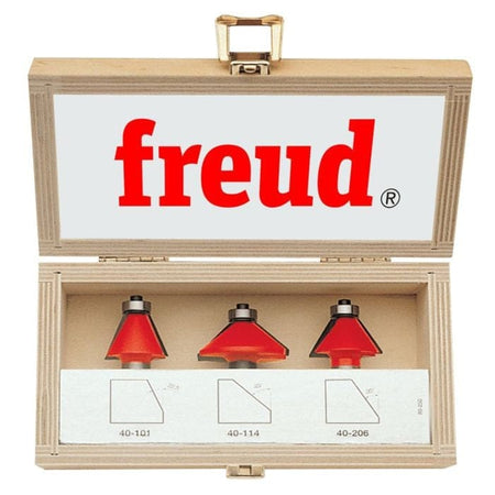 Freud 3-piece chamfer router bit set displayed in a wooden case with transparent lid. Includes bits #40-101, #40-114, and #40-206 with diagrams showing 22.5°, 30°, and 45° chamfer profiles