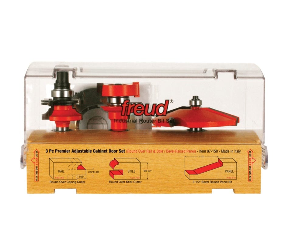 The Freud 97-150 3-piece cabinet bit set shown in its wooden storage box with a clear plastic cover and profile diagrams on the front.