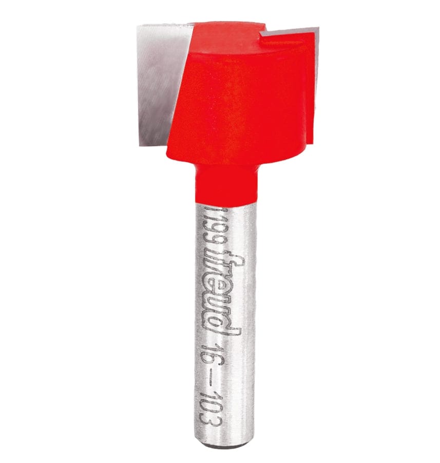 Studio product shot of the Freud 16-102 mortising router bit, featuring a silver 1/4-inch shank with laser markings and a wide, red Perma-SHIELD coated cutter head with down-shear geometry.