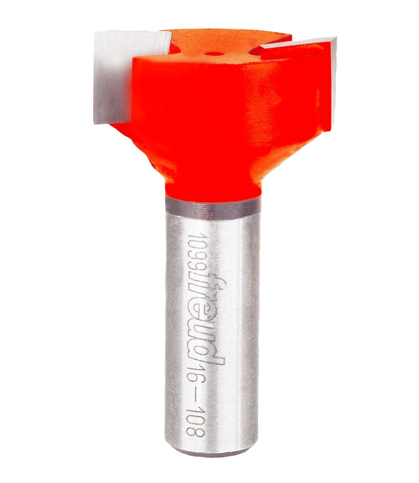 A studio product view of the Freud 16-108 mortising router bit with sharp silver carbide cutting edges, a bright red body, and a polished 1/2 inch steel shank.