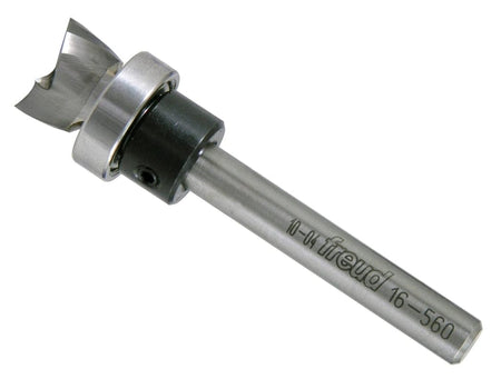 A high-angle studio shot of the Freud 16-560 1/2-inch mortising bit, showing the polished steel shank, integrated top ball-bearing guide, and sharp carbide cutting head.