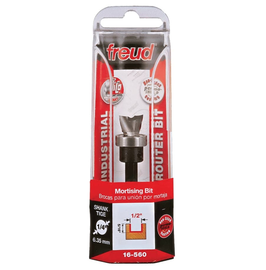 Retail clamshell packaging for the Freud 16-560 industrial mortising bit, displaying the 1/2-inch diameter, 5/16-inch carbide height, and the non-stick Perma-SHIELD coating.