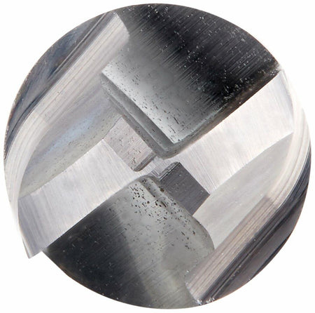 A macro, top-down view directly into the cutting end of the Freud 18-104 router bit, showing the precision-ground carbide cutting edges.