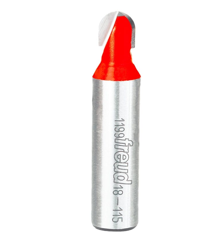 Studio product view of the Freud 18-115 router bit, featuring a 1/2 inch silver shank and a red Perma-SHIELD coated round nose cutting head with a 3/16 inch radius tip.