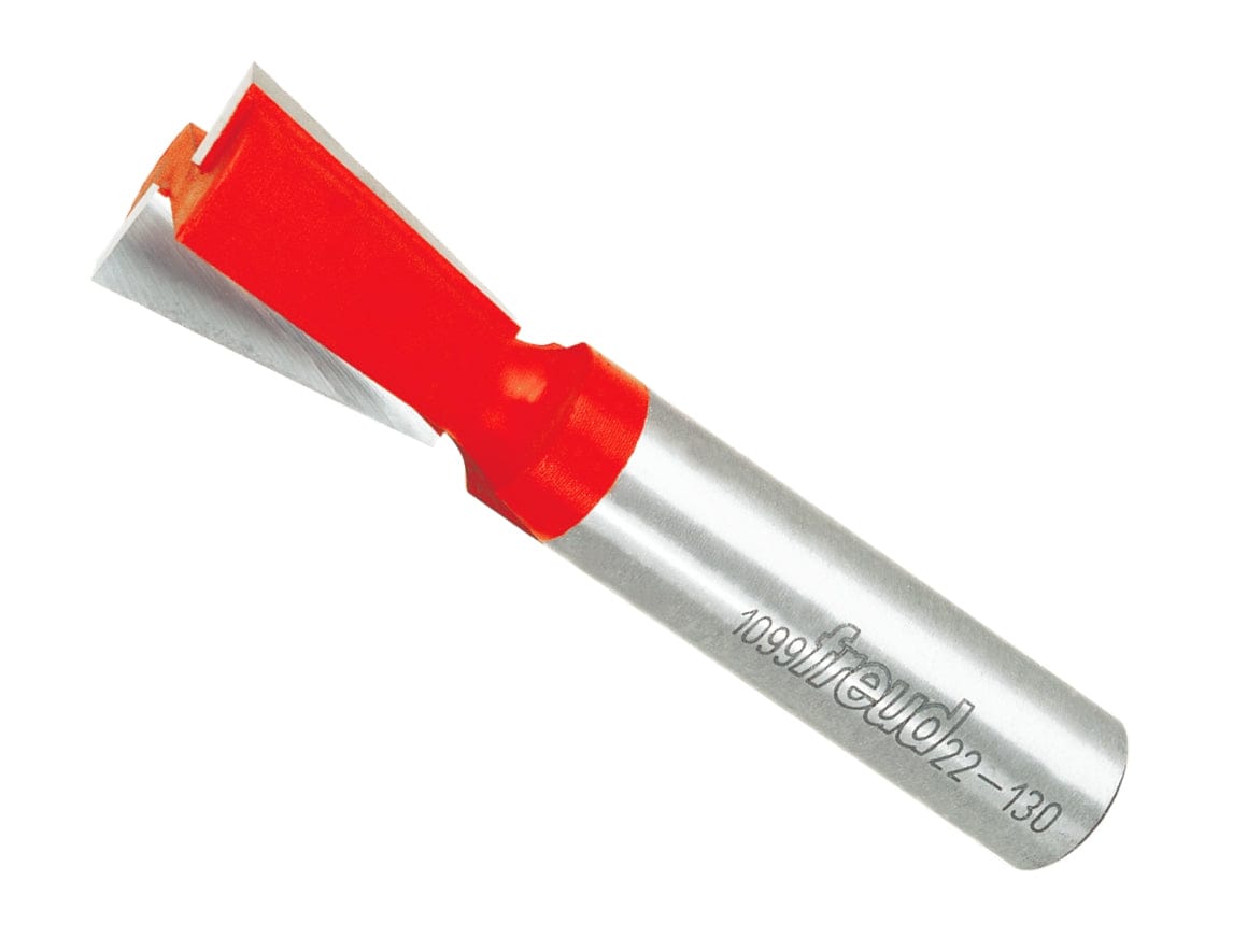 A studio product photograph of the Freud 22-130 dovetail router bit featuring two red carbide-tipped cutting flutes on a 1/2 inch silver shank.
