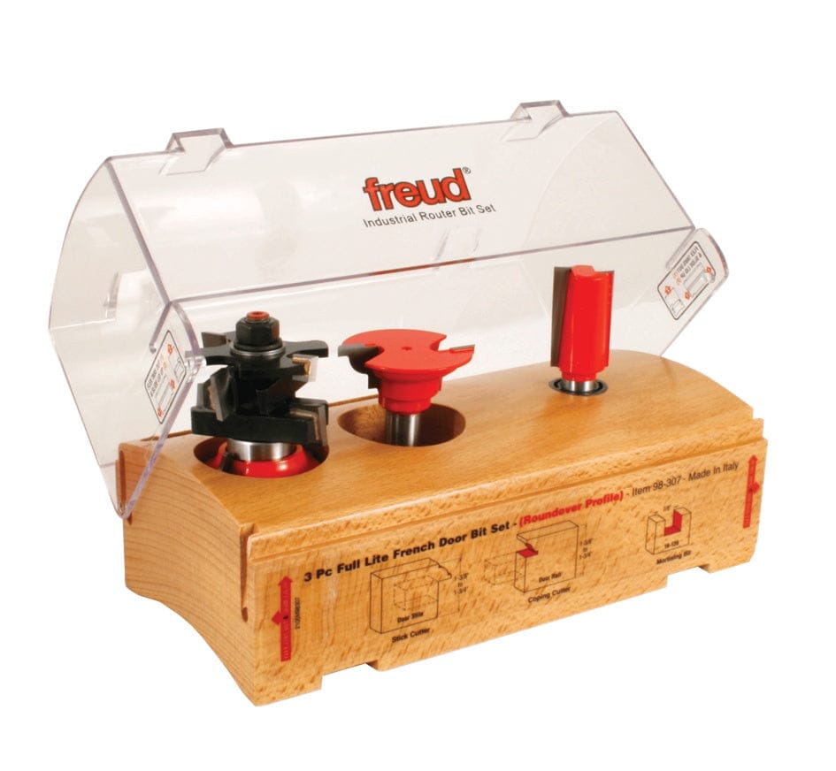 The Freud 98-307 3-piece French door router bit set in its wooden storage box, shown at an angle with the clear protective lid open