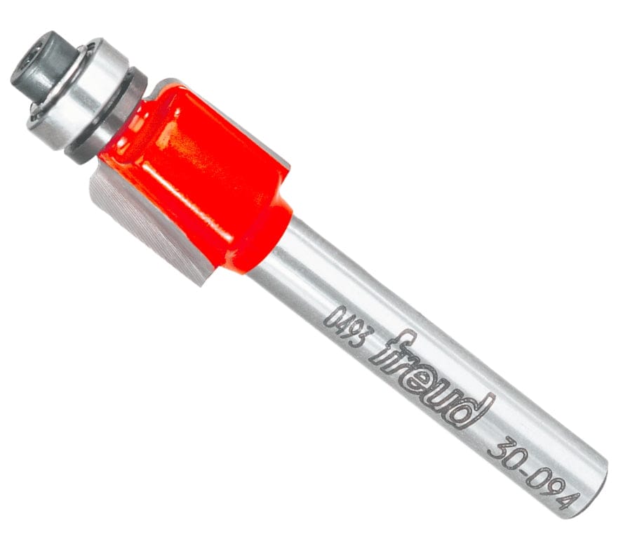 Studio shot of the Freud 30-094 Cove router bit featuring a red Perma-SHIELD body, two carbide cutters, 1/4 inch silver shank, and top ball bearing guide.
