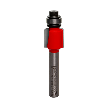 Studio shot of the Freud 30-094 Cove router bit featuring a red Perma-SHIELD body, two carbide cutters, 1/4 inch silver shank, and top ball bearing guide.