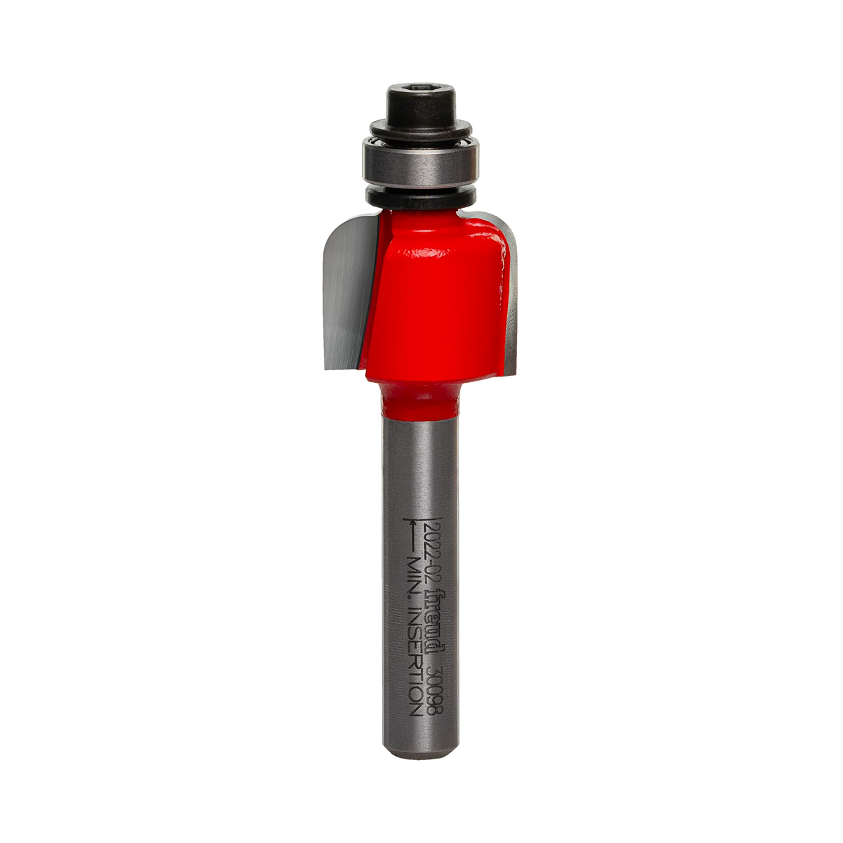 A high-quality studio photograph of the Freud 30-098 cove router bit, showing its red body, sharp carbide cutting edges, top-mounted steel ball bearing, and a 1/4 inch polished shank.