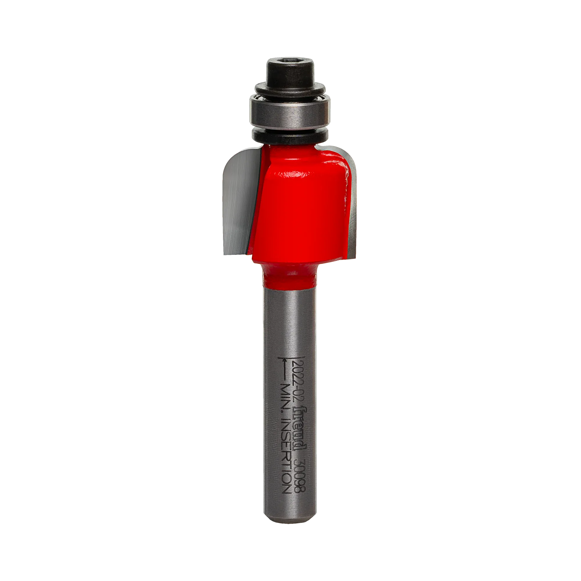 A high-quality studio photograph of the Freud 30-098 cove router bit, showing its red body, sharp carbide cutting edges, top-mounted steel ball bearing, and a 1/4 inch polished shank.