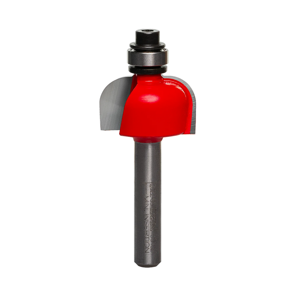 A professional studio photograph of the Freud 30-102 cove router bit, showcasing its bright red body, sharp silver carbide cutting edges, top-mounted steel ball bearing, and a polished 1/4 inch shank.