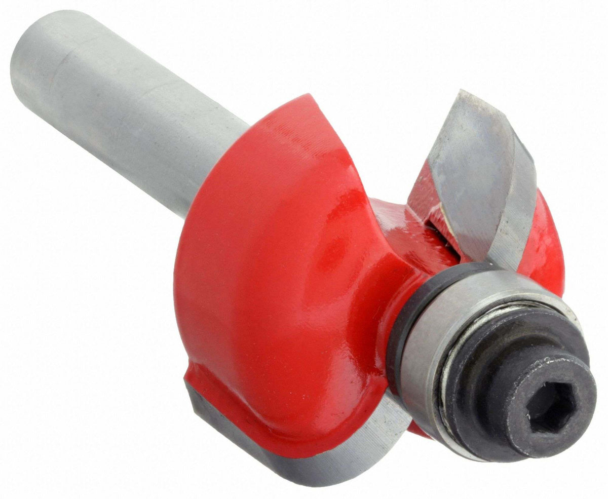 A close-up studio shot of the Freud 30-106 carbide cove router bit, showing the red Perma-SHIELD coating, the high-density carbide cutting edges, and the top ball-bearing guide.