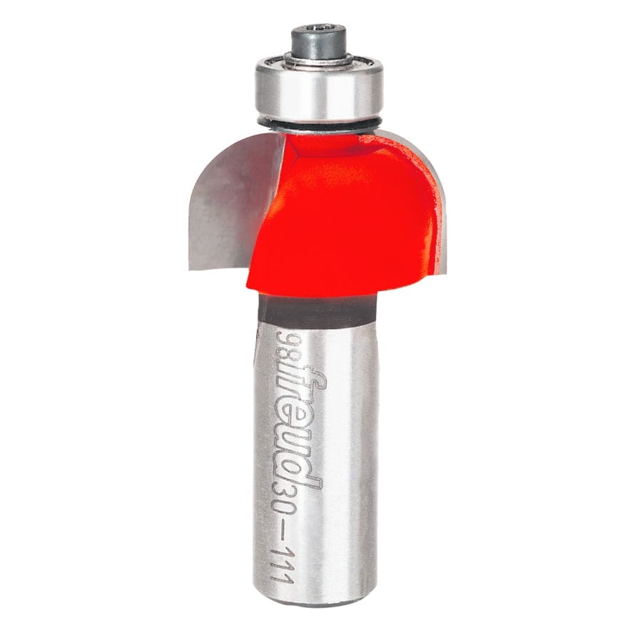 Studio shot of the Freud 30-111 Cove router bit featuring a red Perma-SHIELD body, two carbide cutters, 1/2 inch silver shank, and top ball bearing guide.