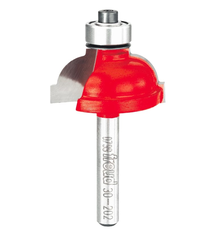 Studio shot of the Freud 30-202 Cove and Fillet router bit featuring a red Perma-SHIELD body, two carbide cutters, 1/4 inch silver shank, and top ball bearing guide.