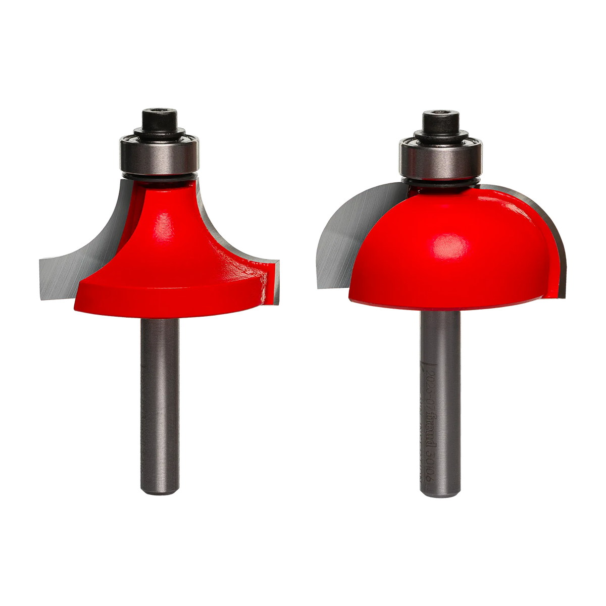A professional studio photograph of the Freud 33-106 set, featuring a matching 1/2 inch radius cove bit and a rounding over bit with red Perma-SHIELD coating, silver TiCo carbide cutting edges, top-mounted pilot bearings, and polished 1/4 inch steel shanks.