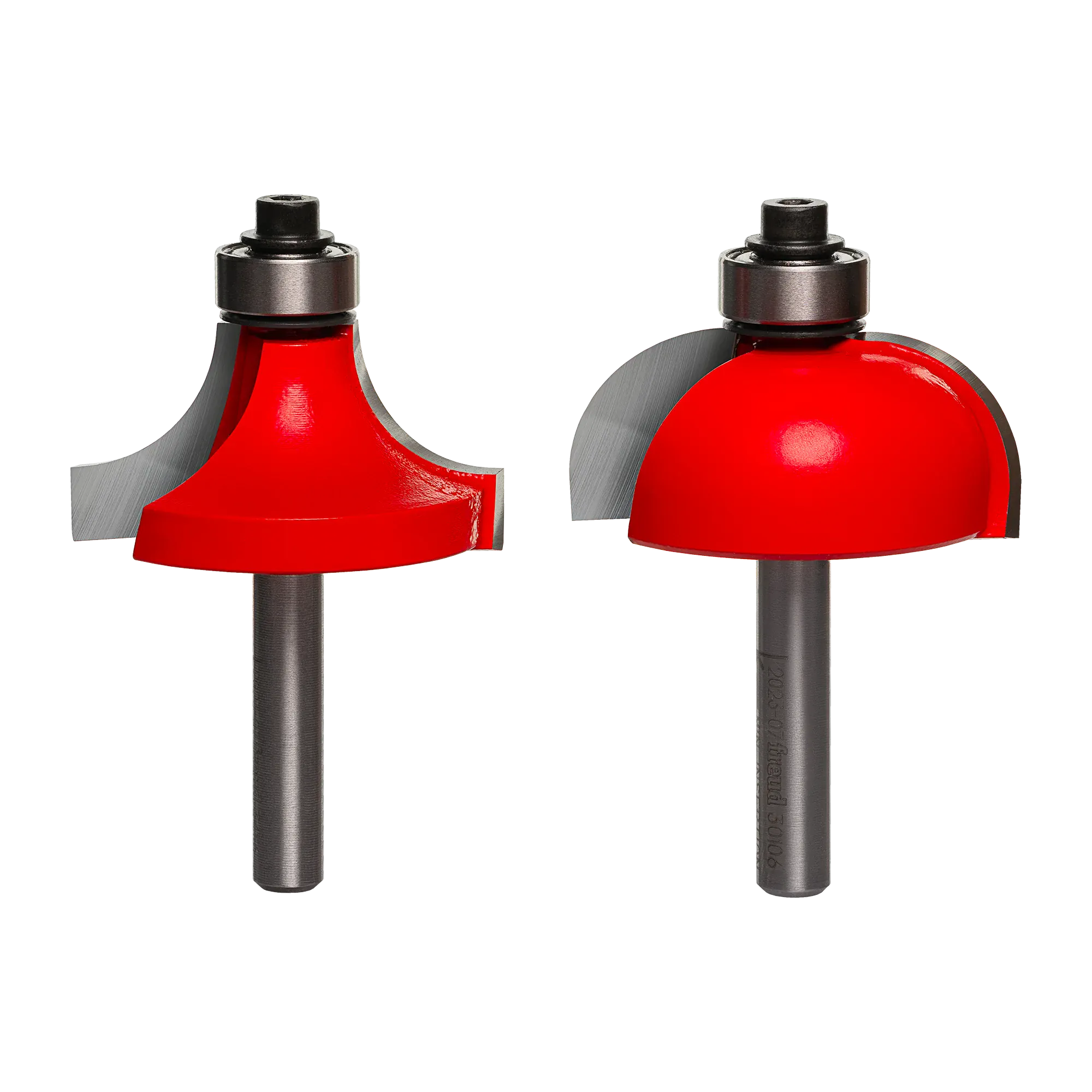 A professional studio photograph of the Freud 33-106 set, featuring a matching 1/2 inch radius cove bit and a rounding over bit with red Perma-SHIELD coating, silver TiCo carbide cutting edges, top-mounted pilot bearings, and polished 1/4 inch steel shanks.