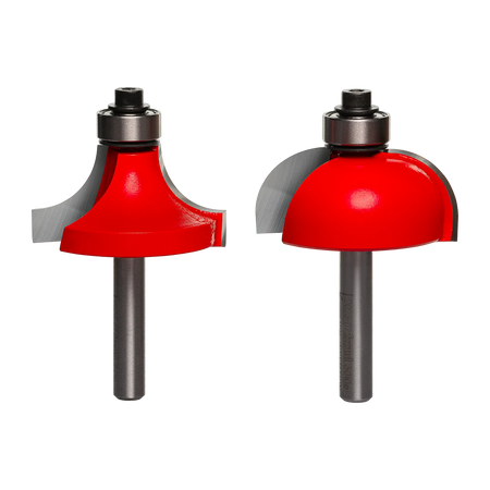 A professional studio photograph of the Freud 33-106 set, featuring a matching 1/2 inch radius cove bit and a rounding over bit with red Perma-SHIELD coating, silver TiCo carbide cutting edges, top-mounted pilot bearings, and polished 1/4 inch steel shanks.