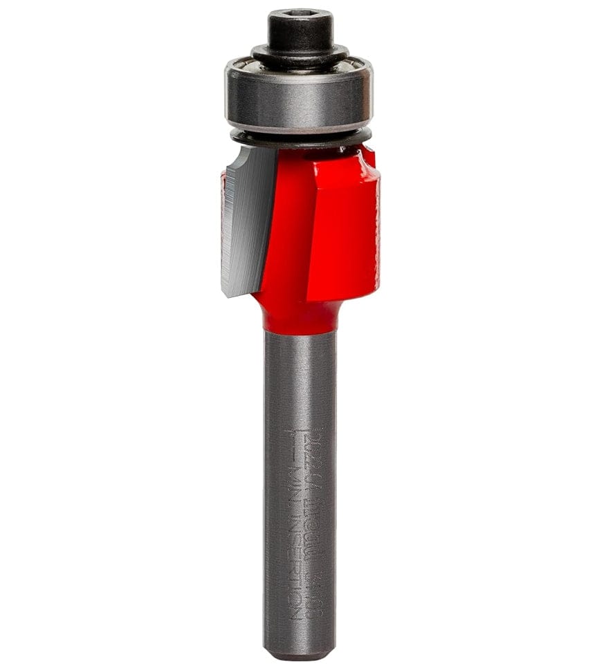 A side-profile view of the Freud 34-100 rounding over bit against a white background, highlighting the dual high-density carbide cutting edges and the precision-mounted top ball bearing.